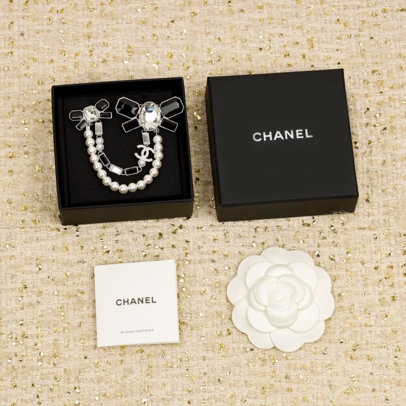 Ch*el brooches